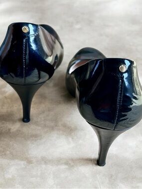 Ted Baker Black Patent Round-Toe Heels with Floral Lining